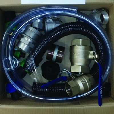 A box filled with various hoses and a Molasses sight glass/connection kit
